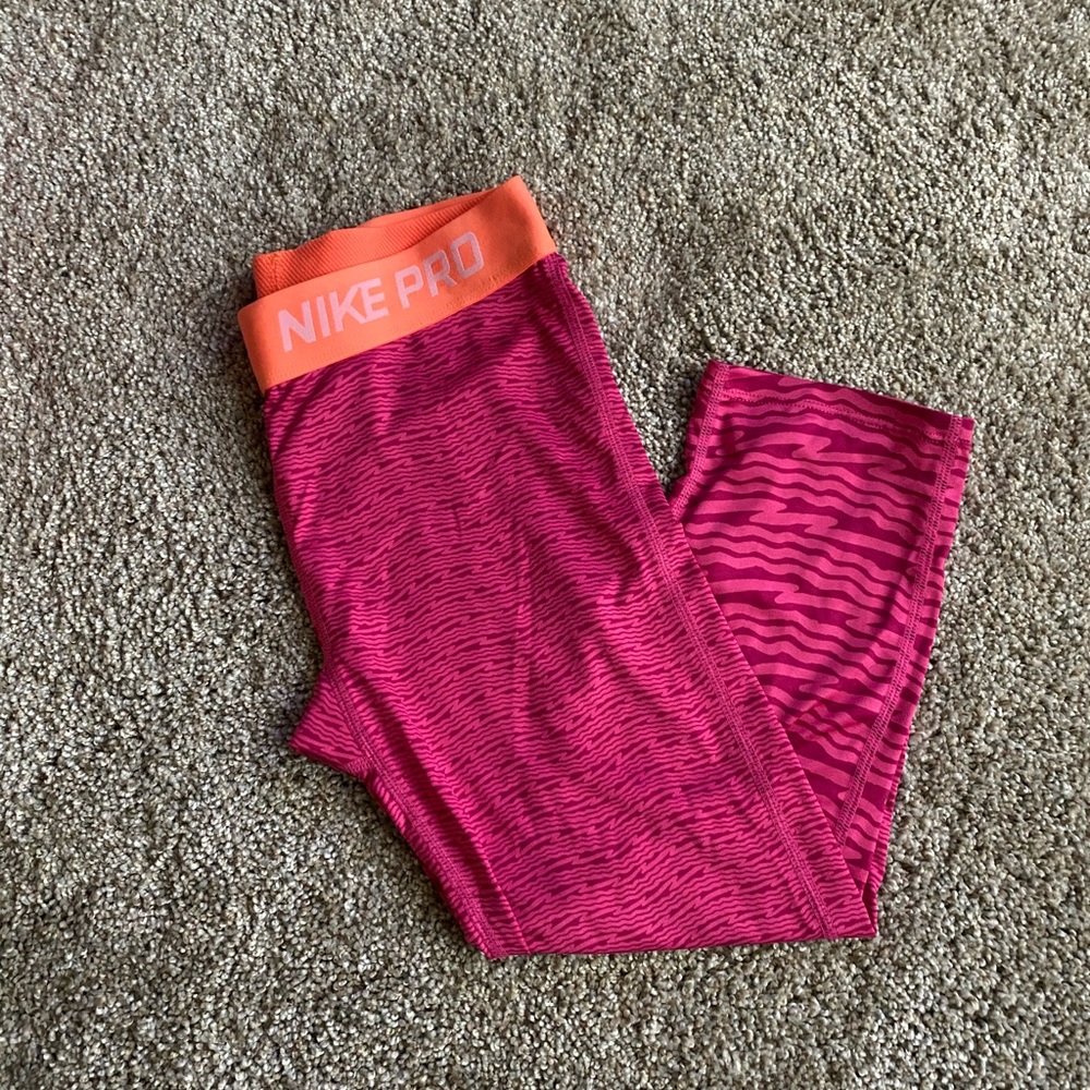 Pink and orange Nike leggings